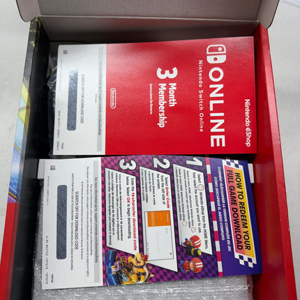 Nintendo Switch™ Console with Neon Blue & Red Joy-Con + Mario Kart™ 8 Deluxe + 3-Month Nintendo Switch Online – Open Box