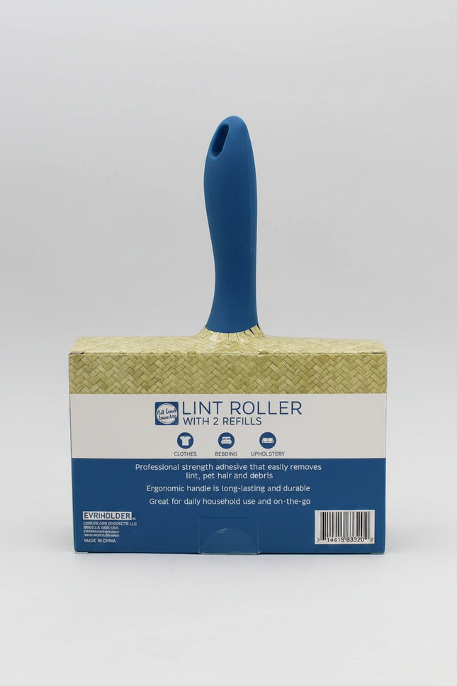 Lint roller with blue handle and packaging on a gray background