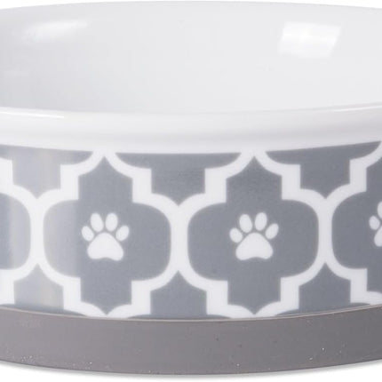 Cat food bowl with paw print pattern on a white background