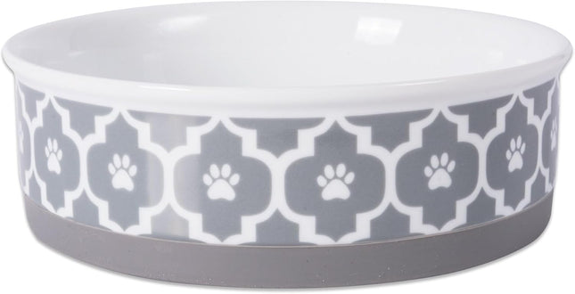 Cat food bowl with paw print pattern on a white background