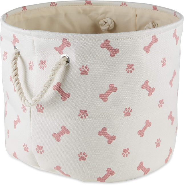 White storage basket with pink bone and paw pattern on a white background