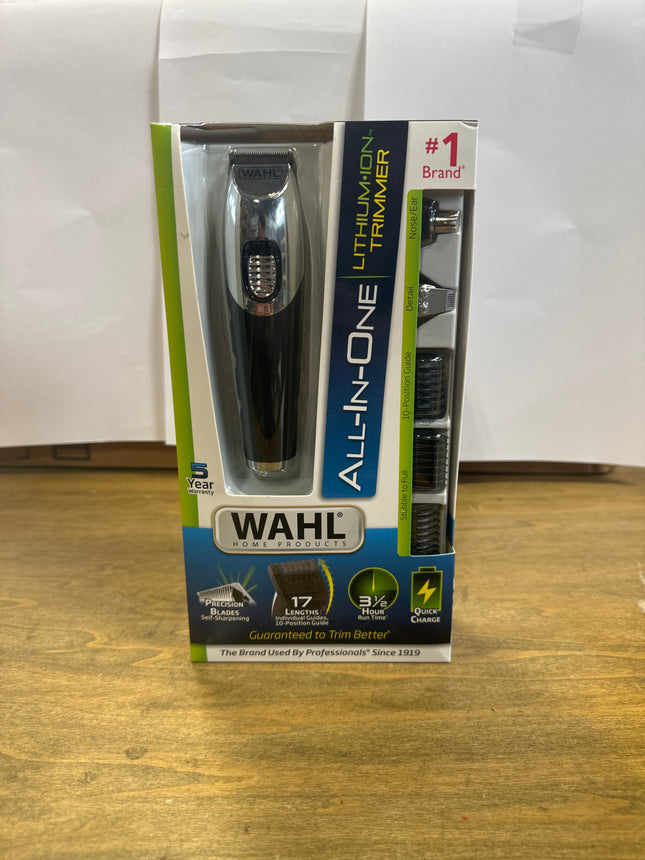 Wahl All-In-One Lithium Ion Trimmer in packaging, showing 17 length settings, quick charge feature, and 3.5-hour run time, with precision self-sharpening blades and 5-year warranty.