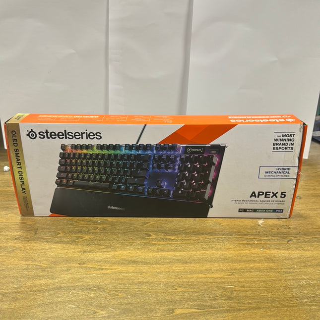 SteelSeries Apex 5 Hybrid Mechanical Gaming Keyboard in packaging, available at a discounted price as an open box item.”