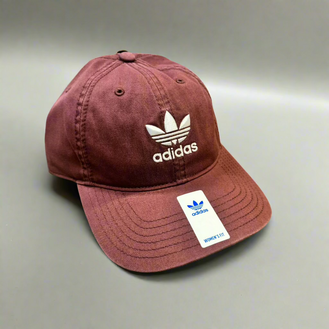 Adidas WM Originals Relaxed Strapback in Quiet Crimson Purple, featuring a relaxed fit and adjustable strap, ideal for casual or athletic wear.