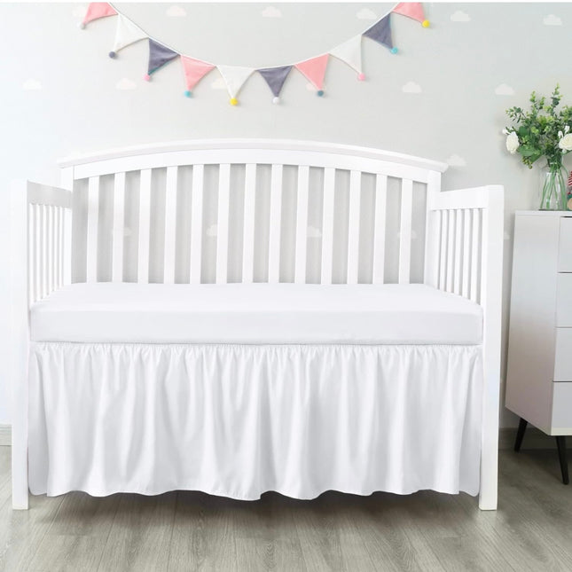 “Biloban white crib bed skirt with pleated design, 28 x 52 inches, 14-inch drop, adjustable fit for baby nursery”