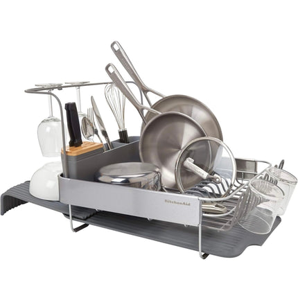 KitchenAid expandable 24-inch dish rack in charcoal with self-draining board and removable caddy.”