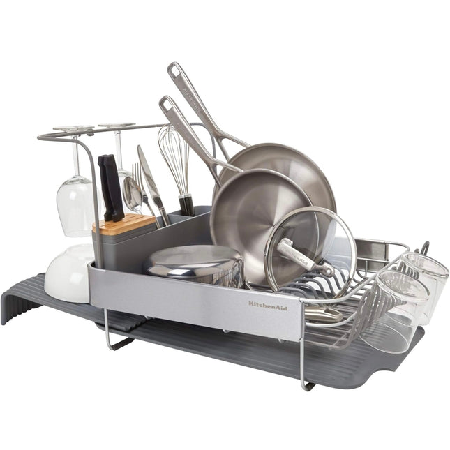 KitchenAid expandable 24-inch dish rack in charcoal with self-draining board and removable caddy.”