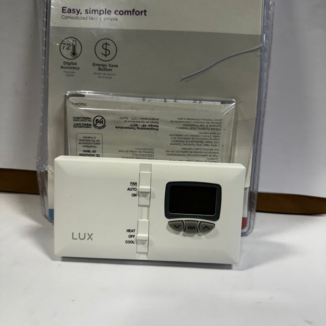 LUX DMH110 Manual Thermostat open box, easy-to-use temperature control”
