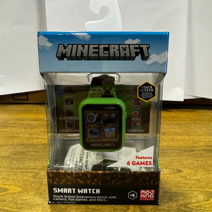 Minecraft Smartwatch in packaging, featuring a touch screen, six games, and multifunctional capabilities.